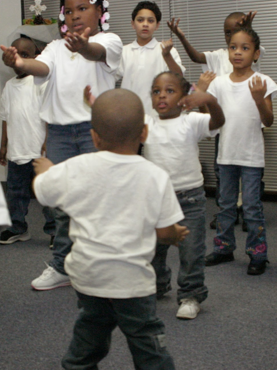 Young children participating in a group performance